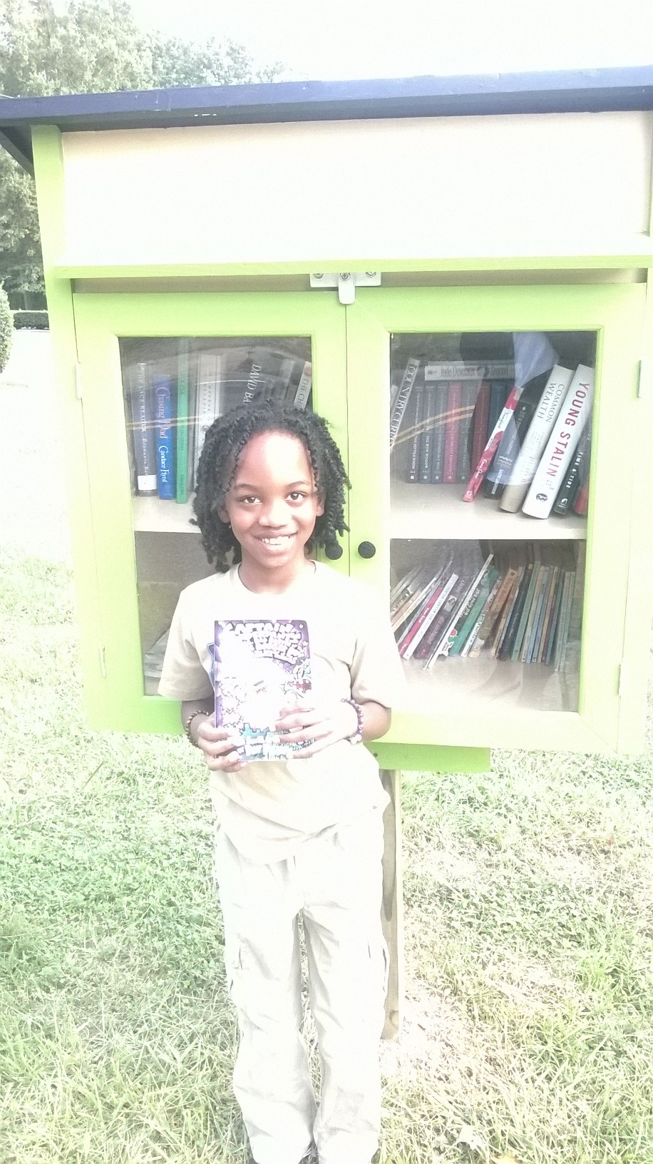 Caelan at the Little Library